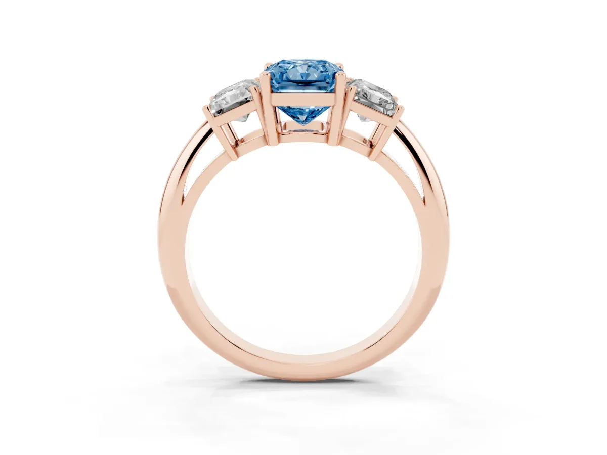 Fancy Blue Three-Stone Radiant Cut Cut Diamond Engagement Ring with Prong Setting on a White Gold Band Rose gold