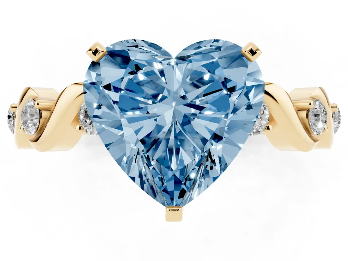 Fancy Blue Heart Cut Diamond Solitaire Twisted Band with Round Accents and Prong Setting Yellow gold