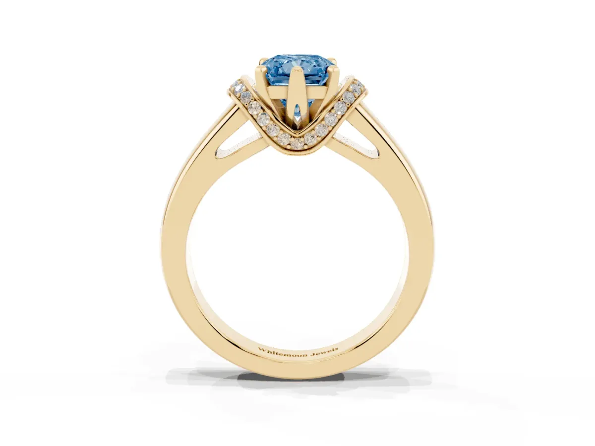 Fancy Blue Radiant Cut Solitaire Diamond Ring with Pave Band and Six-Prong Setting Yellow gold