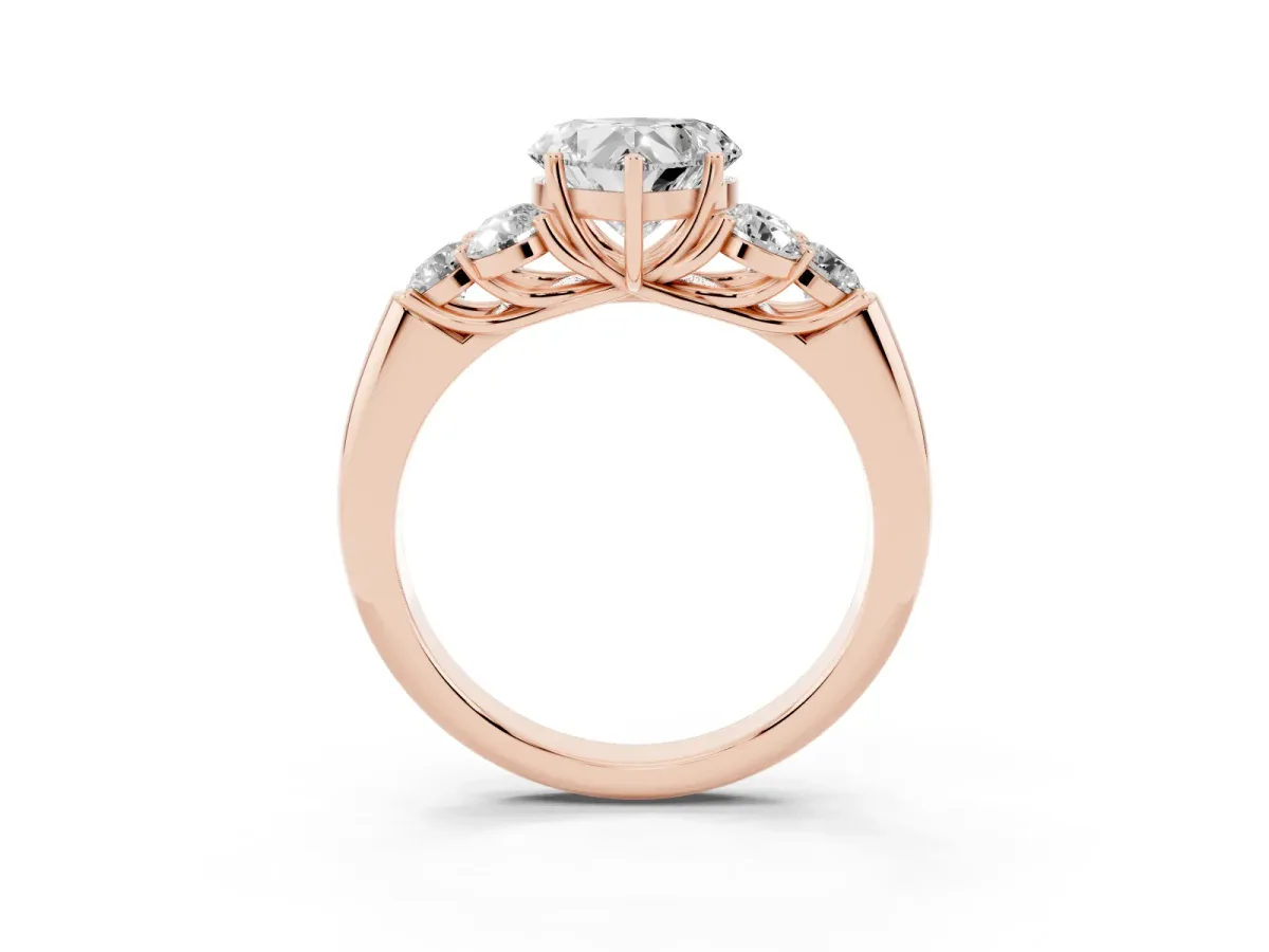 Heart Cut Cut Diamond Cluster Ring with Round Accent Stones and Prong Setting on a Classic Band Rose gold