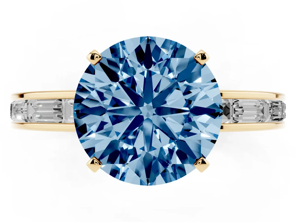 Fancy Blue Round Cut Solitaire Diamond Ring with Channel-Set Baguette Band and Four-Prong Setting Yellow gold