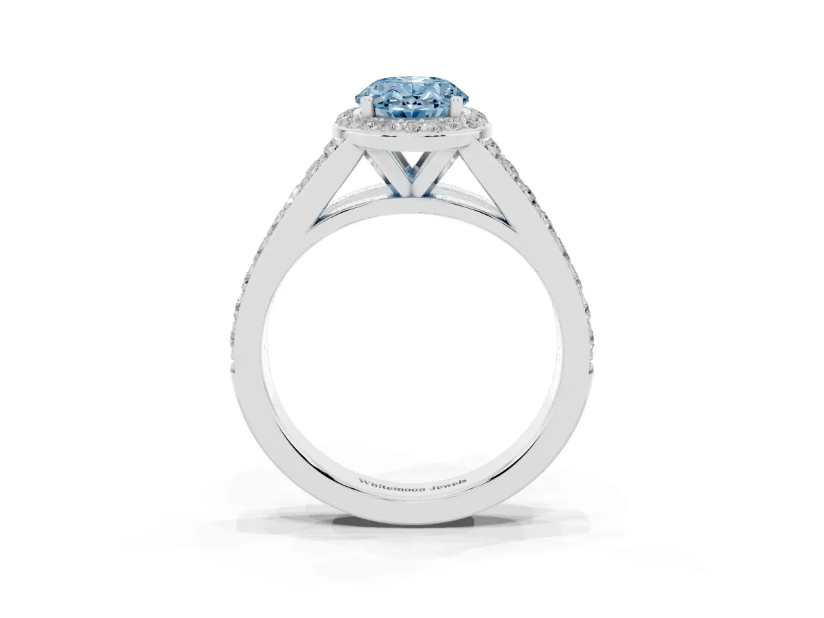 Fancy Blue Oval Cut Diamond Split Shank Halo Ring with Four-Prong Setting Silver