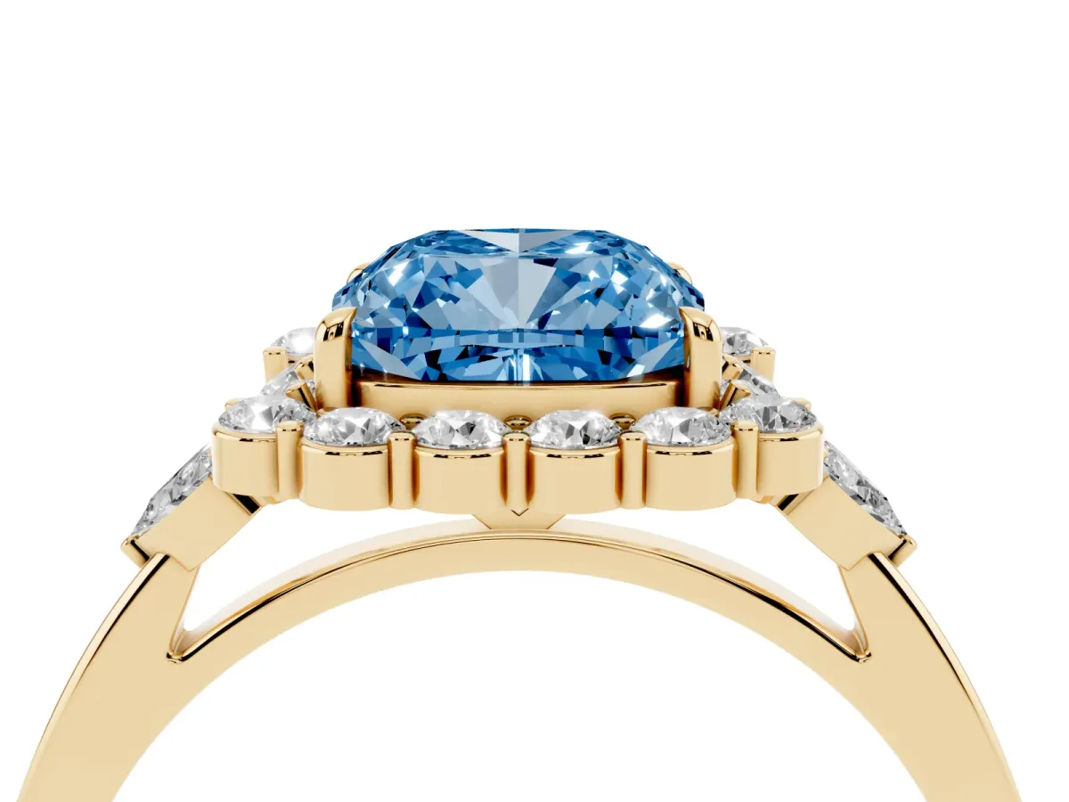 Fancy Blue Cushion Cut Diamond Halo Ring with Pear Side Stones and Prong Setting Yellow gold