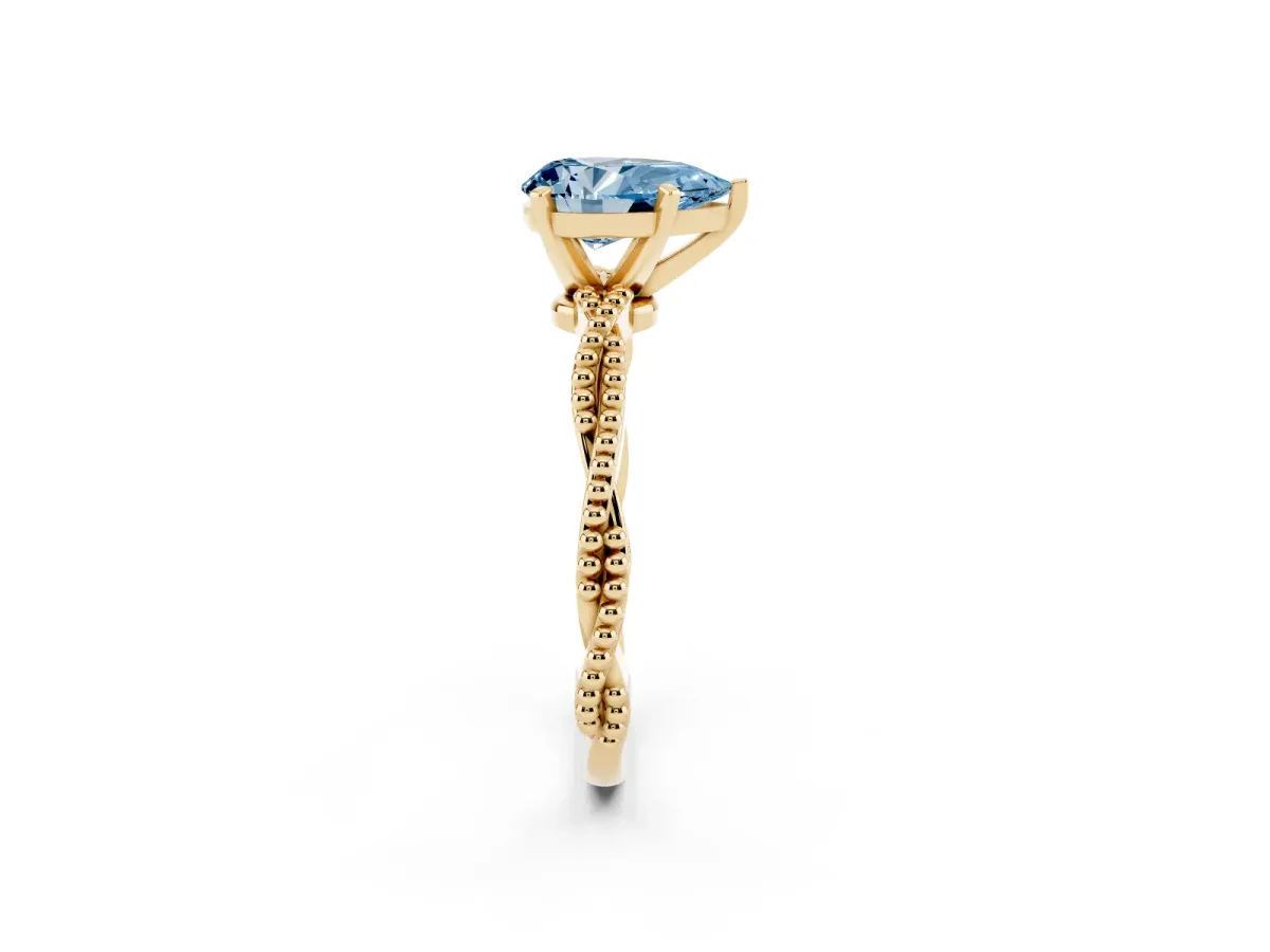 Fancy Blue Pear Cut Solitaire Twisted Band with Bead Prong Setting Yellow gold