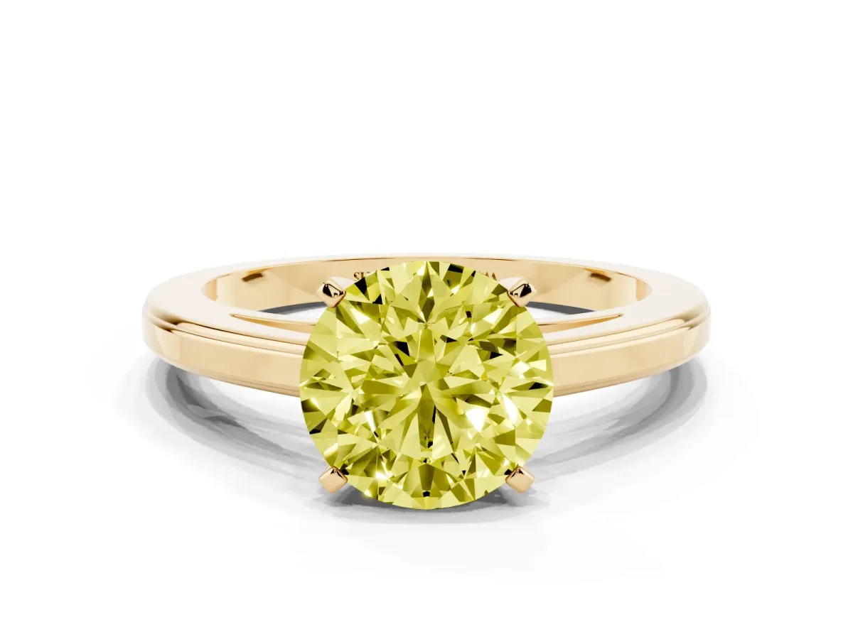 Fancy Yellow Round Cut Solitaire Diamond Ring with Four-Prong Setting and Classic Band Yellow gold