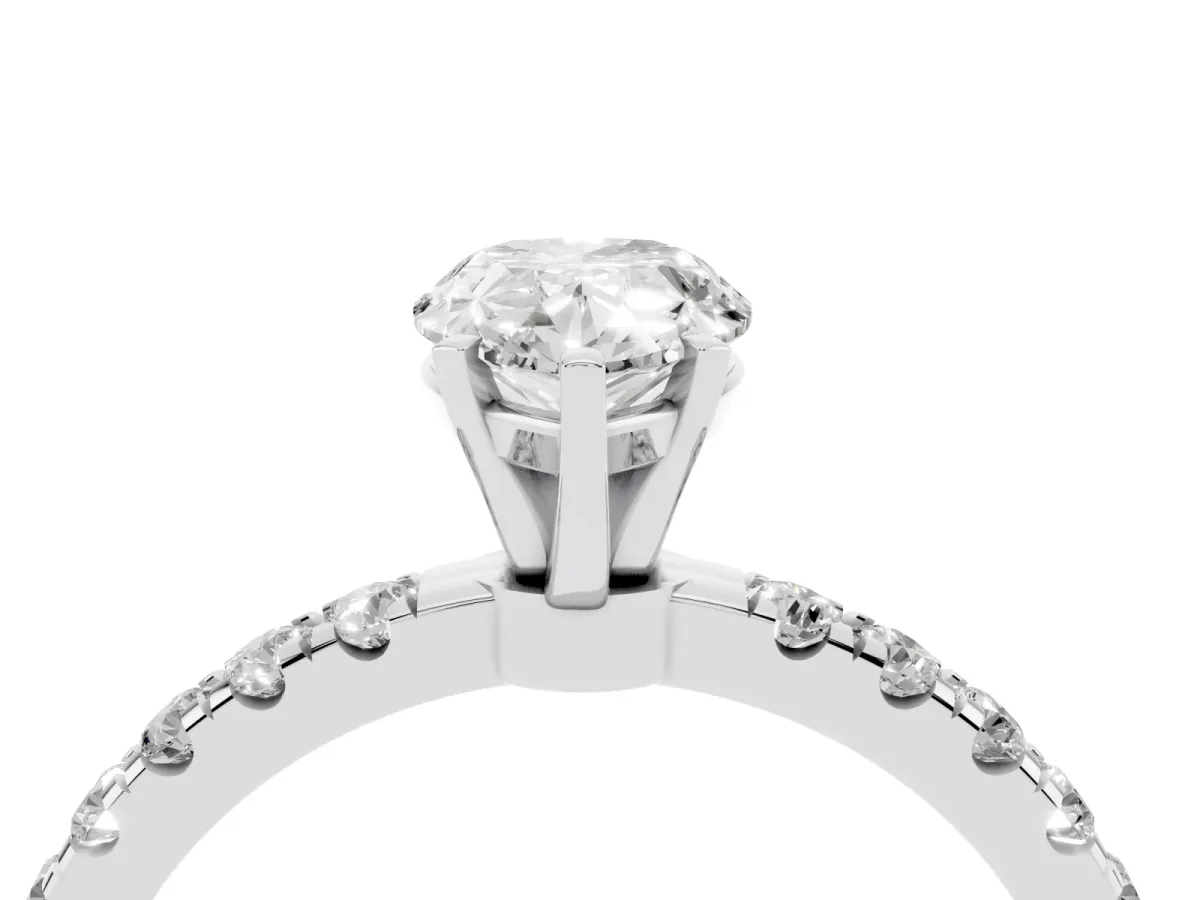 Pear Cut Diamond Solitaire Ring with Pavé Accents and Four-Prong Setting Silver