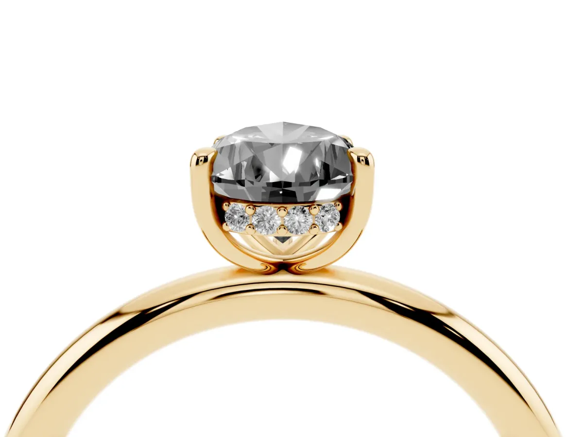 Fancy Black Pear Cut Diamond Solitaire Ring with Thin Band and Four-Prong Setting Yellow gold
