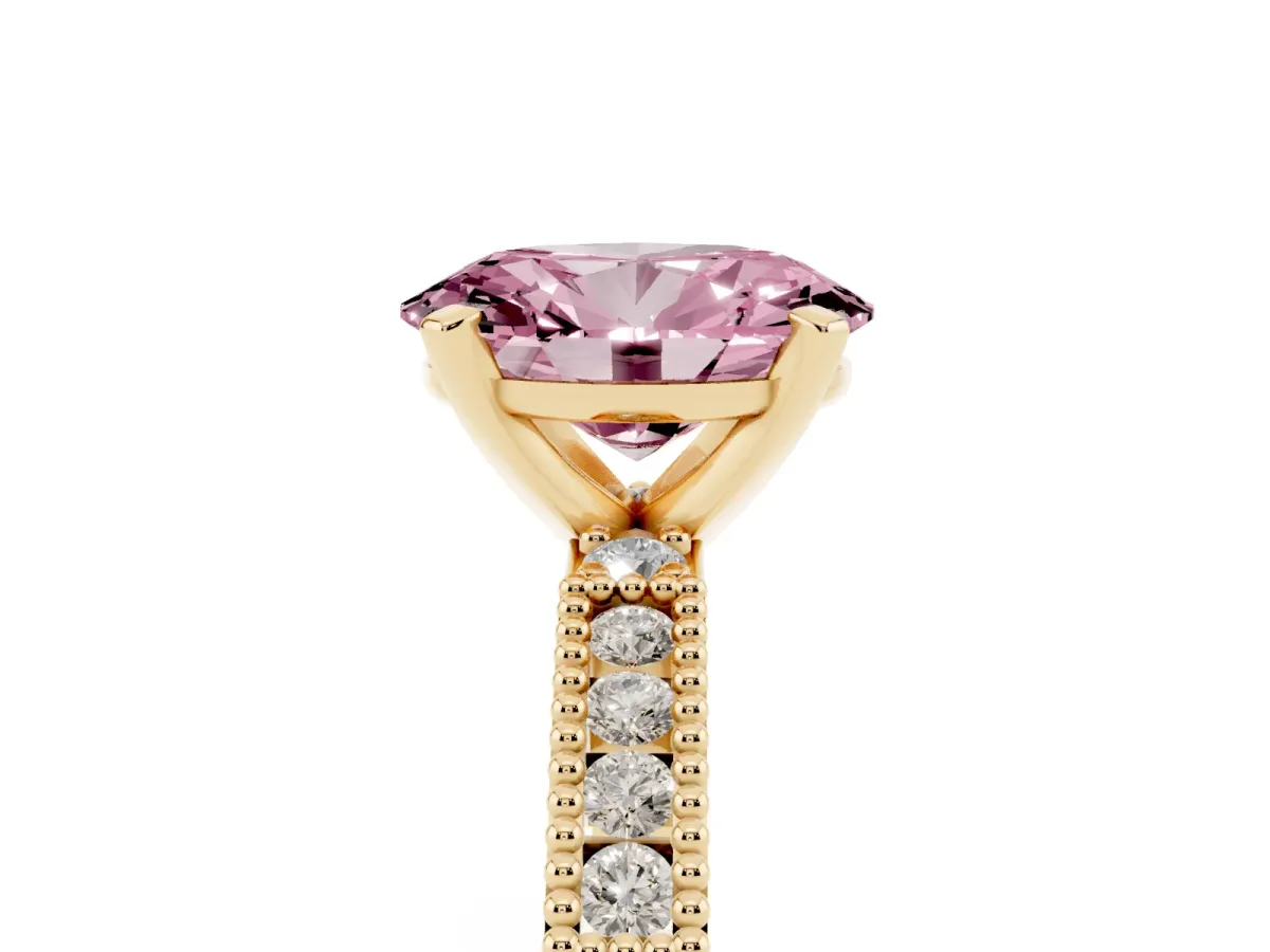 Fancy Pink Oval Cut Solitaire with Pavé Band and Four-Prong Setting Yellow gold