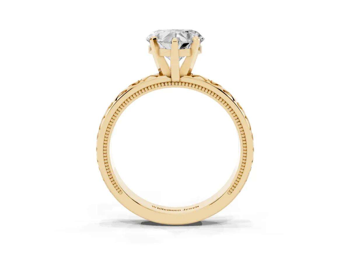 Heart Cut Solitaire Diamond Engagement Ring with XO Engraved Band and Four-Prong Setting Yellow gold