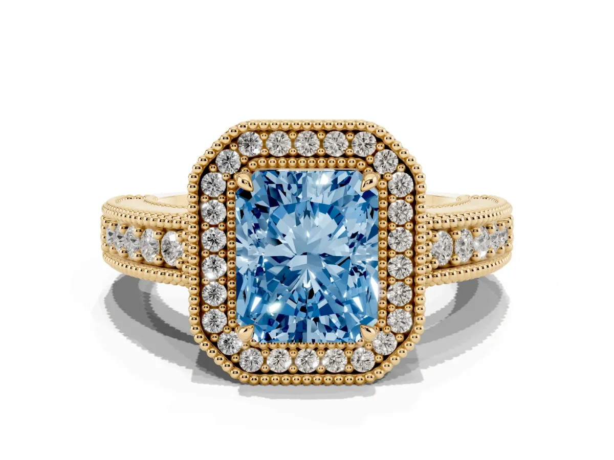 Fancy Blue Radiant Cut Cut Halo Diamond Ring with Pavé Band and Four-Prong Setting Yellow gold