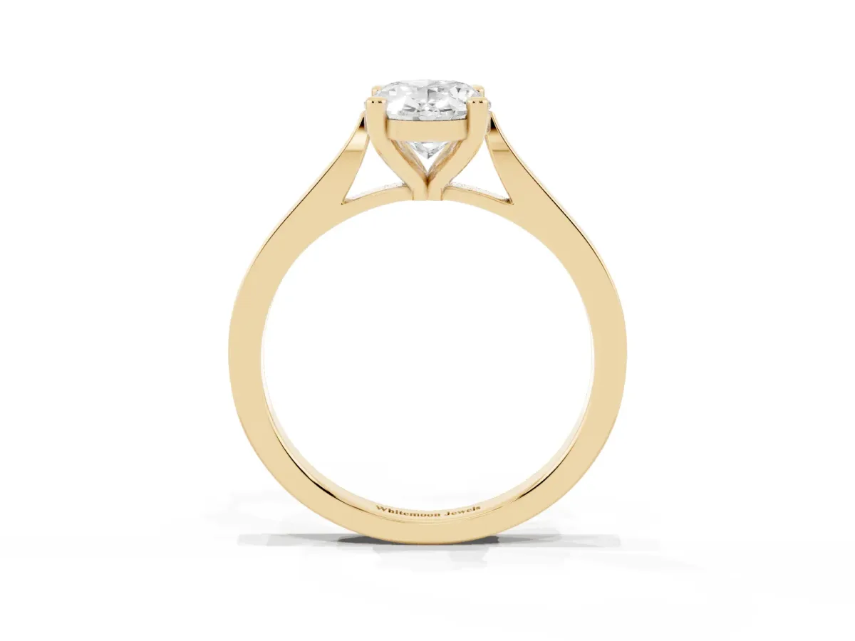 Oval Cut Solitaire Diamond Ring with Four-Prong Setting and Tapered Band Yellow gold