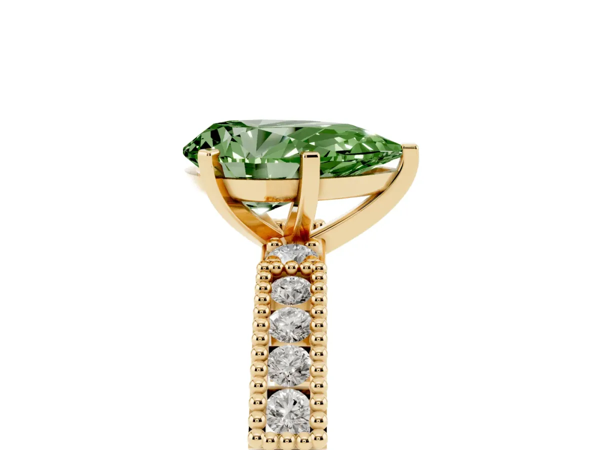 Fancy Green Pear Cut Solitaire with Pavé Band and Four-Prong Setting Yellow gold