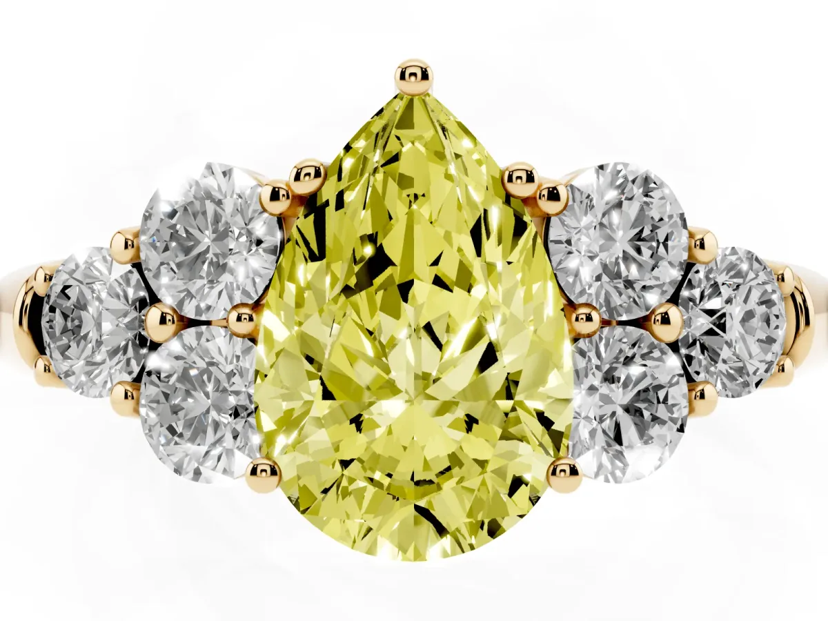 Fancy Yellow Pear Cut Cut Diamond Cluster Ring with Round Accent Stones and Prong Setting on a Classic Band Yellow gold