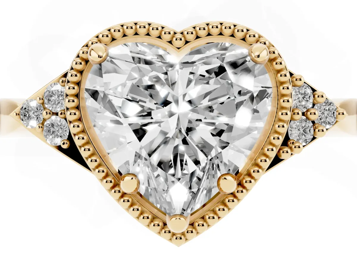 Milgrain Heart Cut Cut Diamond Ring with Tapered Pave Band and Four Prong Setting Yellow gold