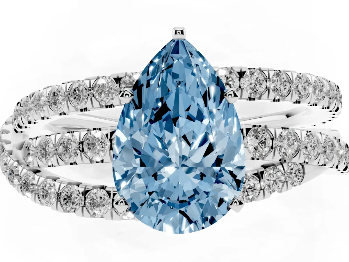 Fancy Blue Pear Cut Solitaire Twist Band with Pavé Setting and Four-Prong Setting Silver
