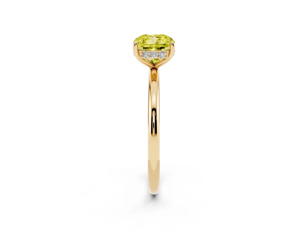 Fancy Yellow Cushion Cut Solitaire Diamond Ring with a Classic Band and Four-Prong Setting Yellow gold