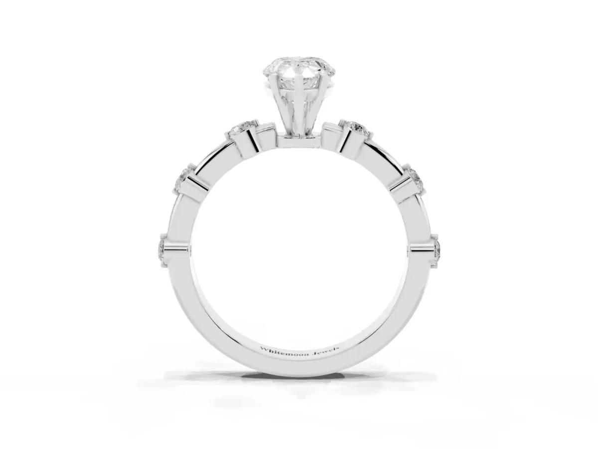 Pear Cut Solitaire Diamond Ring with Bezel Set Side Stones and Prong Setting White gold