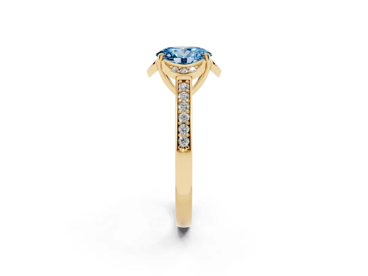 Fancy Blue Oval Cut Cut Halo Diamond Ring with Channel Set Band and Four-Prong Setting Yellow gold