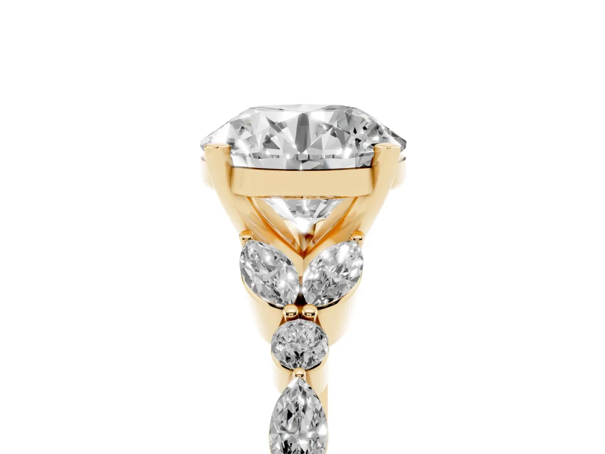 Round Cut Diamond Solitaire Ring with Side Stones and Four-Prong Setting Yellow gold