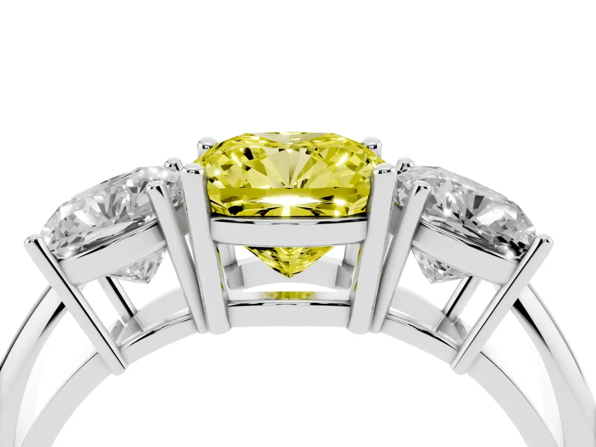 Fancy Yellow Three-Stone Cushion Cut Cut Diamond Engagement Ring with Prong Setting on a White Gold Band White gold