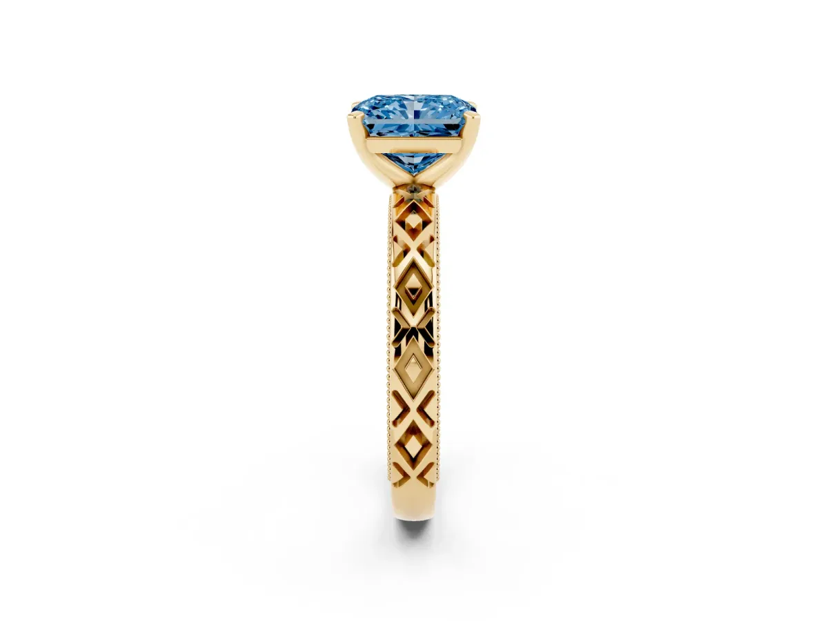 Fancy Blue Radiant Cut Solitaire Diamond Ring with Milgrain and Black Enamel X Pattern Band Yellow gold