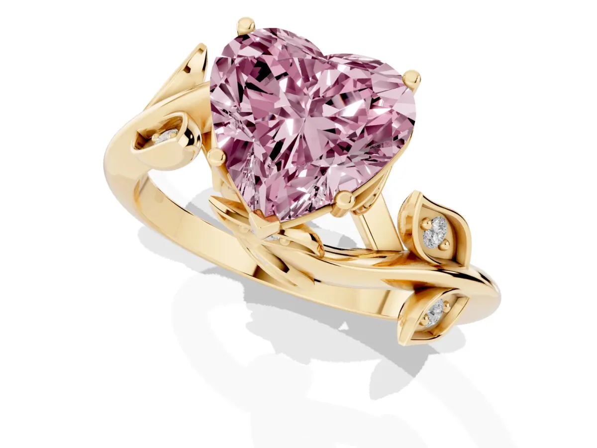Fancy Pink Heart Cut Solitaire Twist Engagement Ring with Leaf Accents and Prong Setting Yellow gold