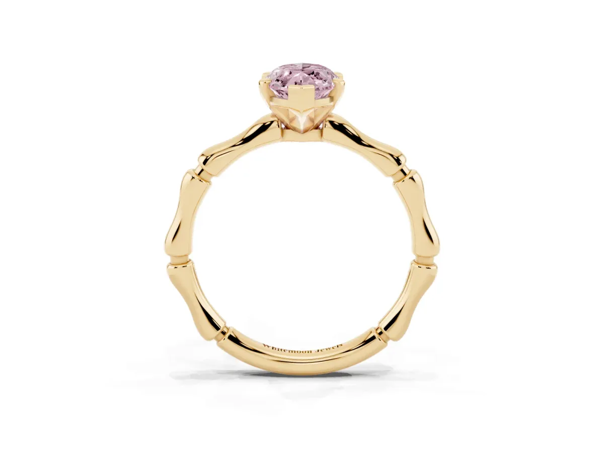 Fancy Pink Marquise Cut Solitaire Diamond Ring with Bamboo Band and Four-Prong Setting Yellow gold