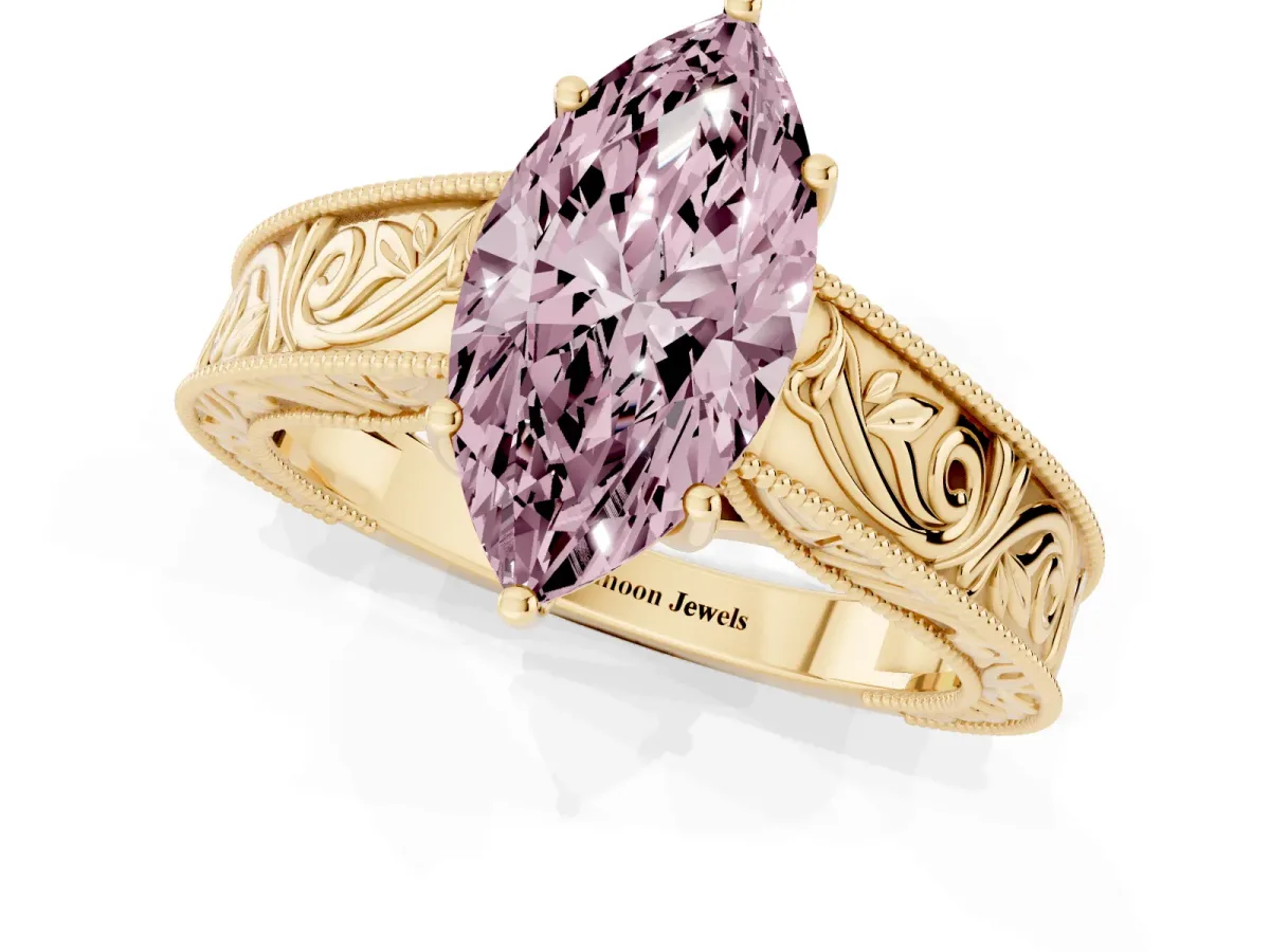 Fancy Pink Marquise Cut Diamond Solitaire Ring with Engraved Band and Four-Prong Setting Yellow gold