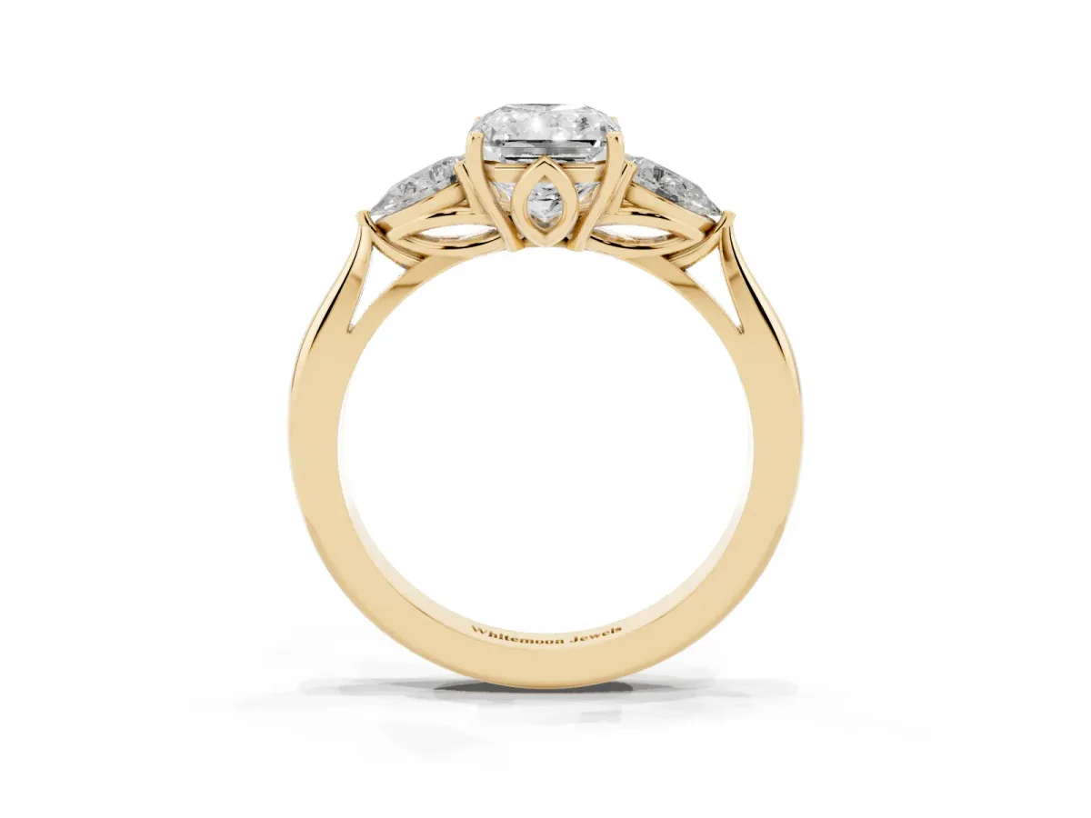 Three-Stone Radiant Cut Brilliant Diamond Solitaire Ring with Tapered Band and Four-Prong Setting Yellow gold