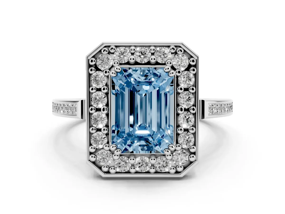 Fancy Blue Emerald Cut Diamond Halo Ring with Split Shank and Four-Prong Setting Silver