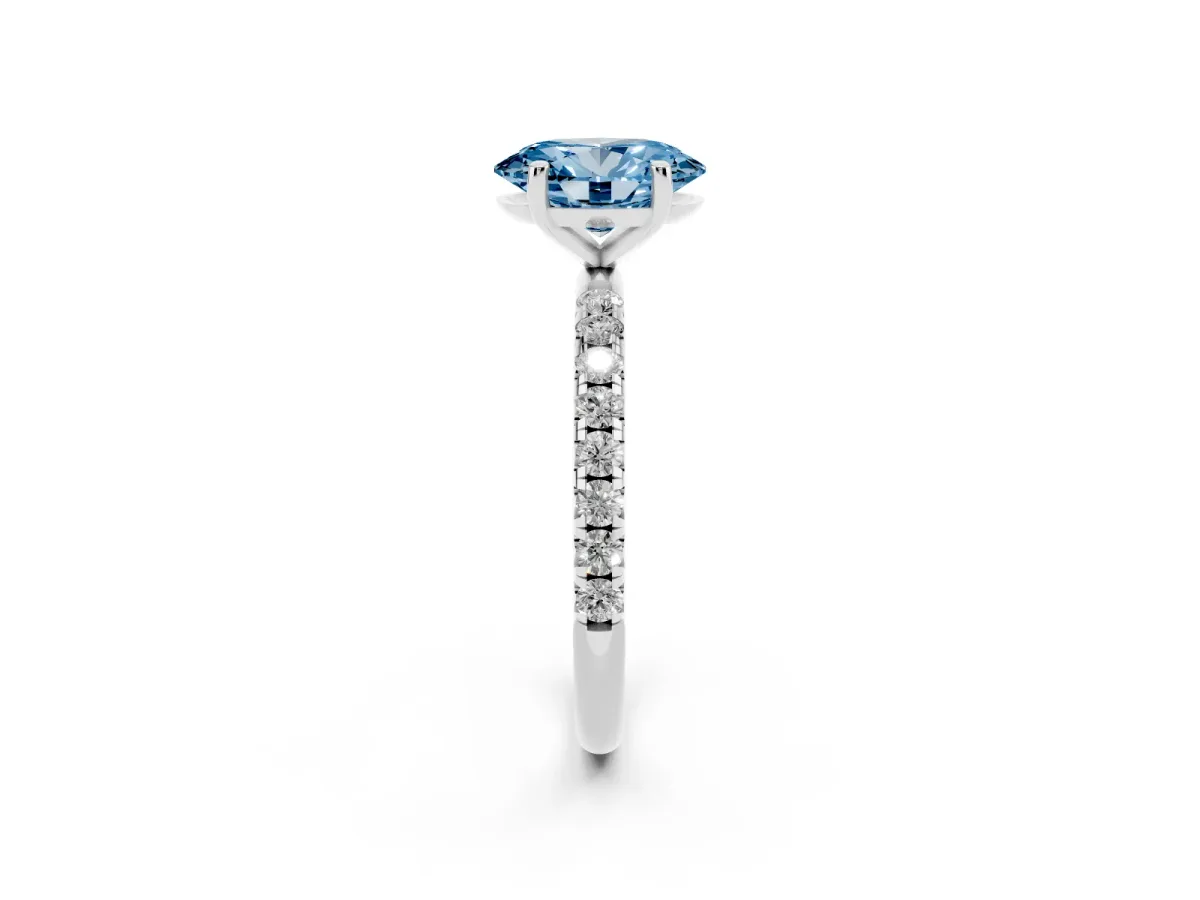 Fancy Blue Oval Cut Cut Diamond Solitaire Ring with Micro Pave Band and Four Prong Setting Silver