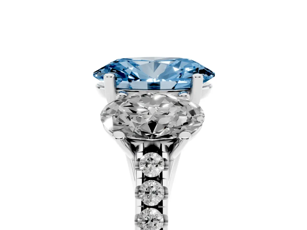 Fancy Blue Three-Stone Oval Cut Diamond Ring with Round Pavé Band and Prong Setting Silver