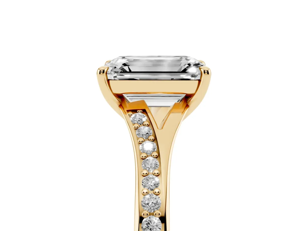 Emerald Cut Diamond Solitaire Ring with Pavé Band and Prong Setting Yellow gold