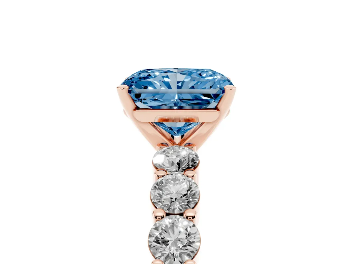 Fancy Blue Radiant Cut Diamond Solitaire Ring with Shared Prong Round Side Stones Rose gold