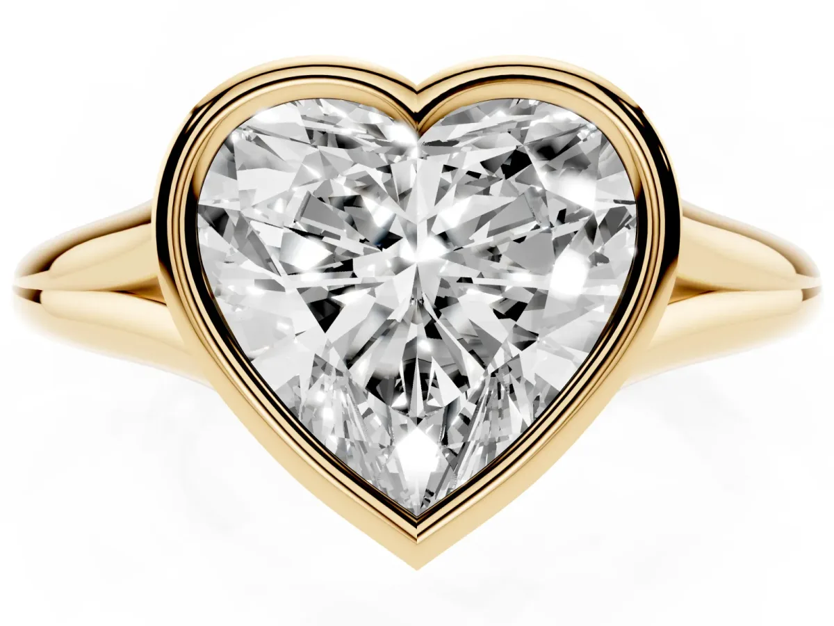 Bezel Set Heart Cut Cut Solitaire Ring with Tapered Band Yellow gold