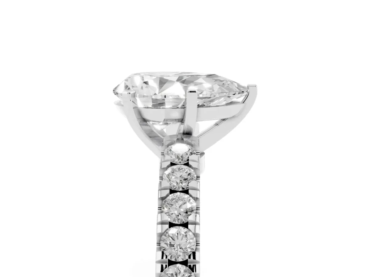 Pear Cut Solitaire Diamond with Pavé Band and Four-Prong Setting Silver