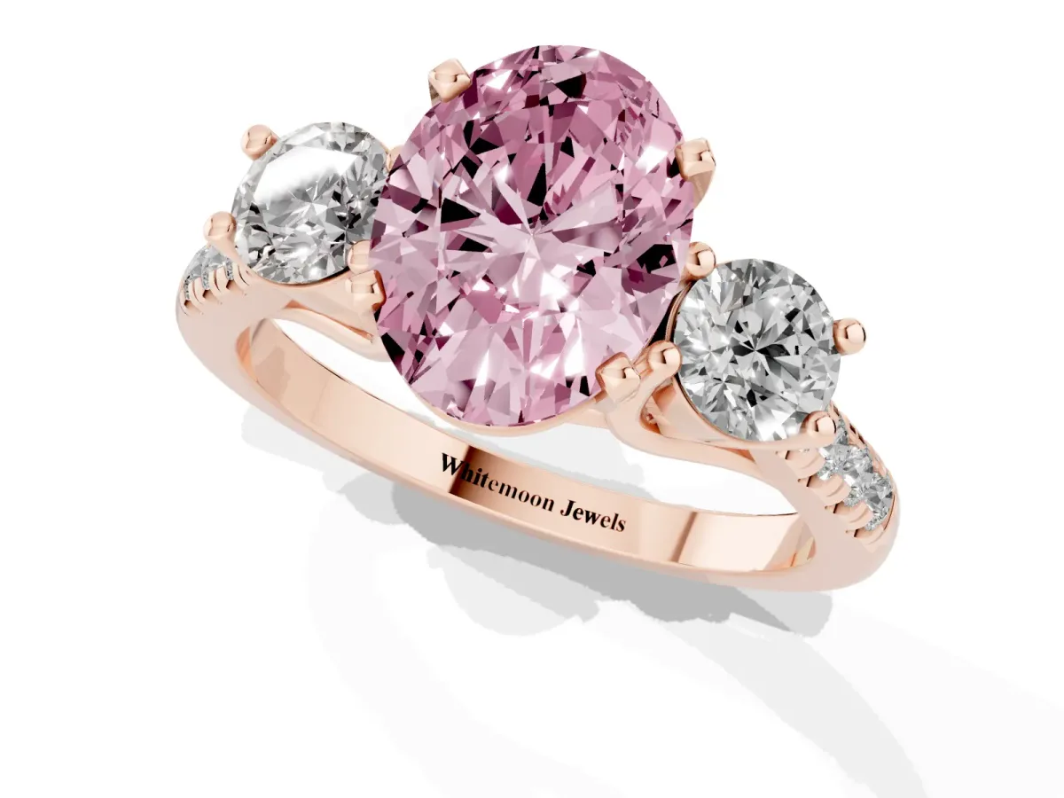 Fancy Pink Three-Stone Oval Cut Diamond Pavé Band with Four-Prong Setting Rose gold