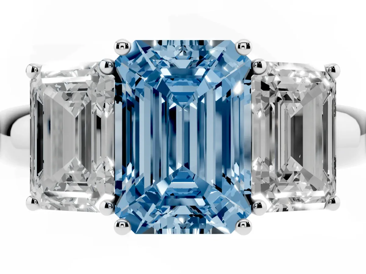 Fancy Blue Emerald Cut Diamond Three-Stone Ring with Four-Prong Setting and Classic Band Platinum