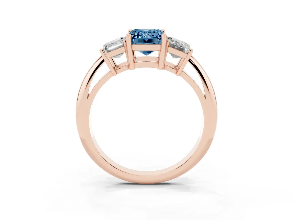 Fancy Blue Three-Stone Emerald Cut Cut Diamond Engagement Ring with Prong Setting on a White Gold Band Rose gold