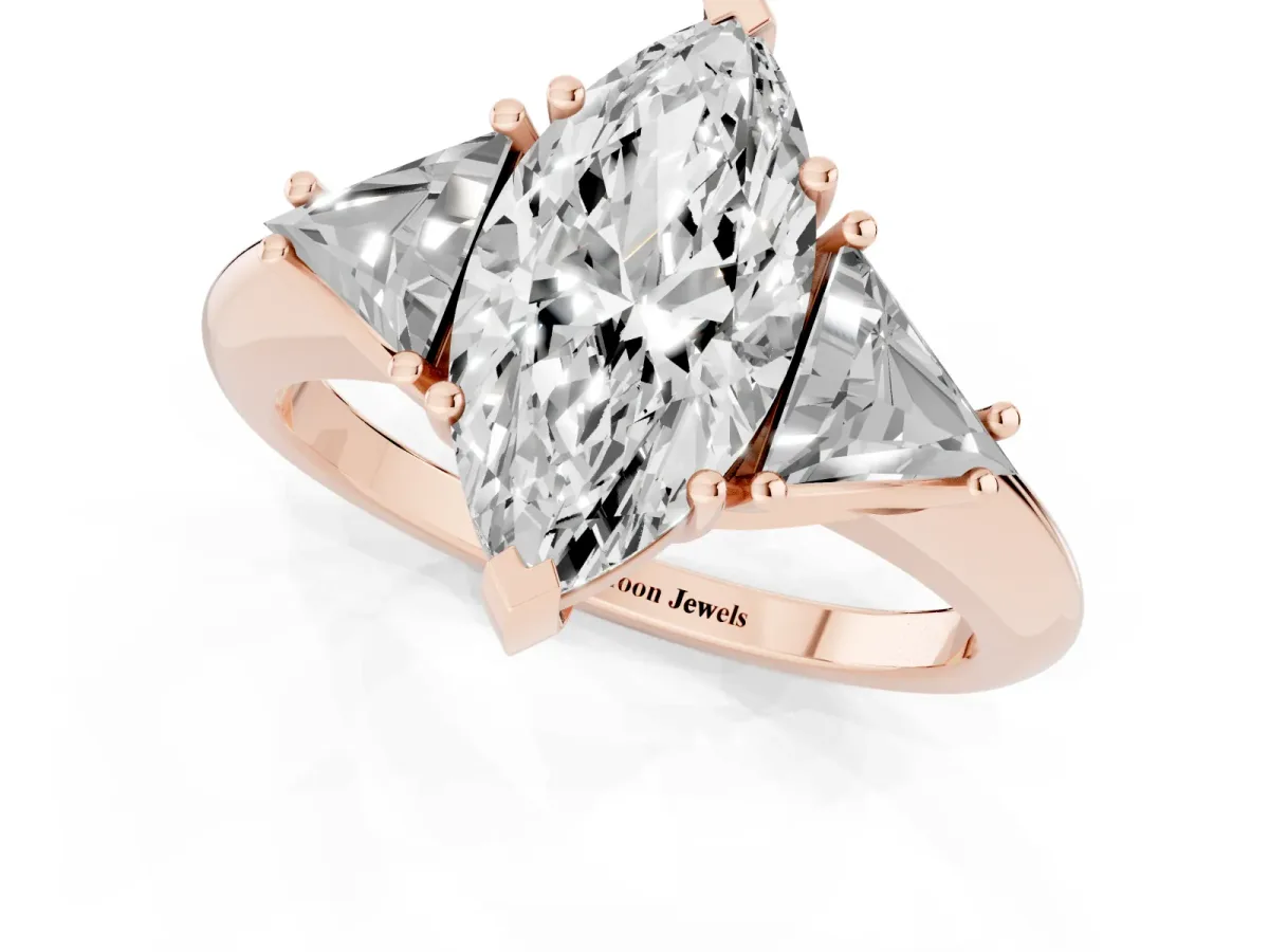 Three-Stone Marquise Cut Diamond Engagement Ring with Trillion Side Stones and Prong Setting Rose gold