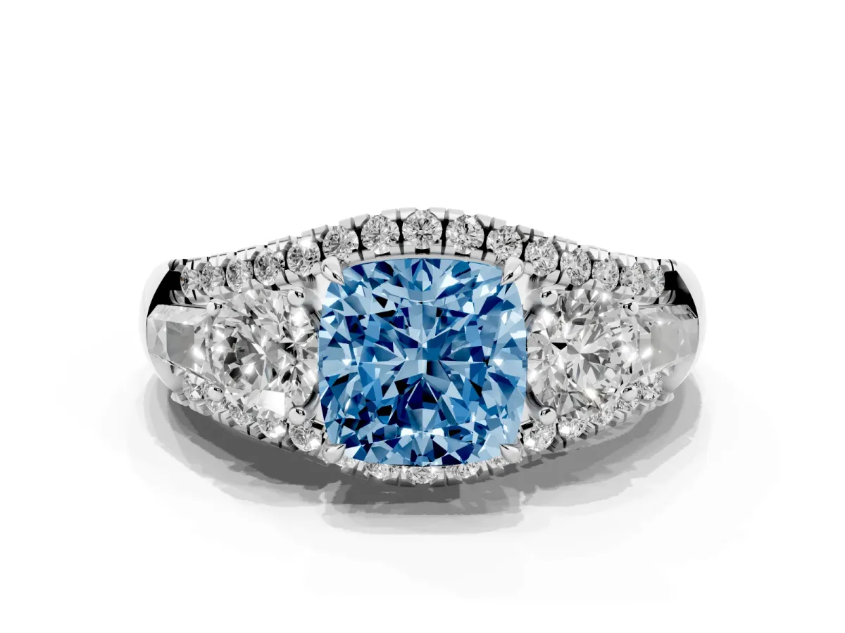 Fancy Blue Three-Stone Cushion Cut Diamond Engagement Ring with Pave Band and Prong Setting Platinum