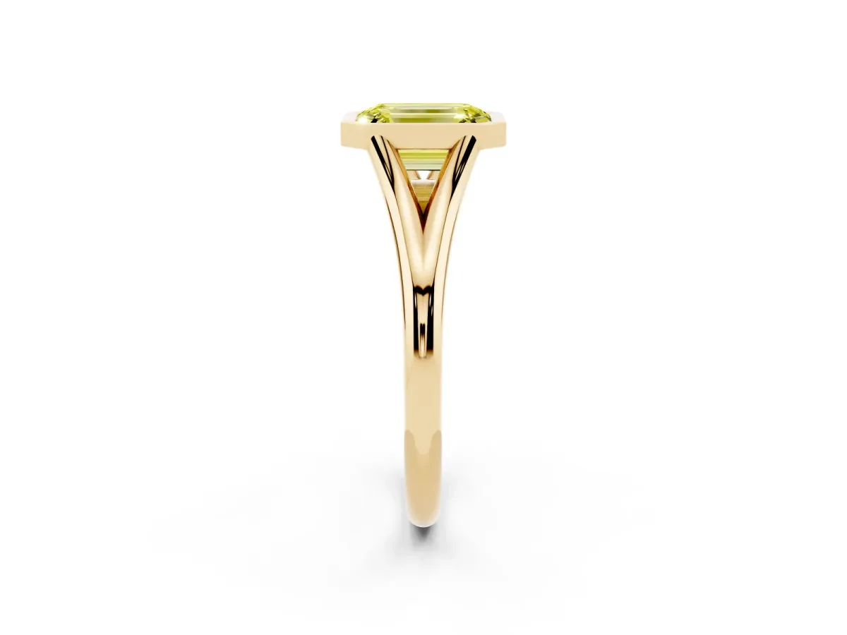 Fancy Yellow Bezel Set Emerald Cut Cut Solitaire Ring with Tapered Band Yellow gold