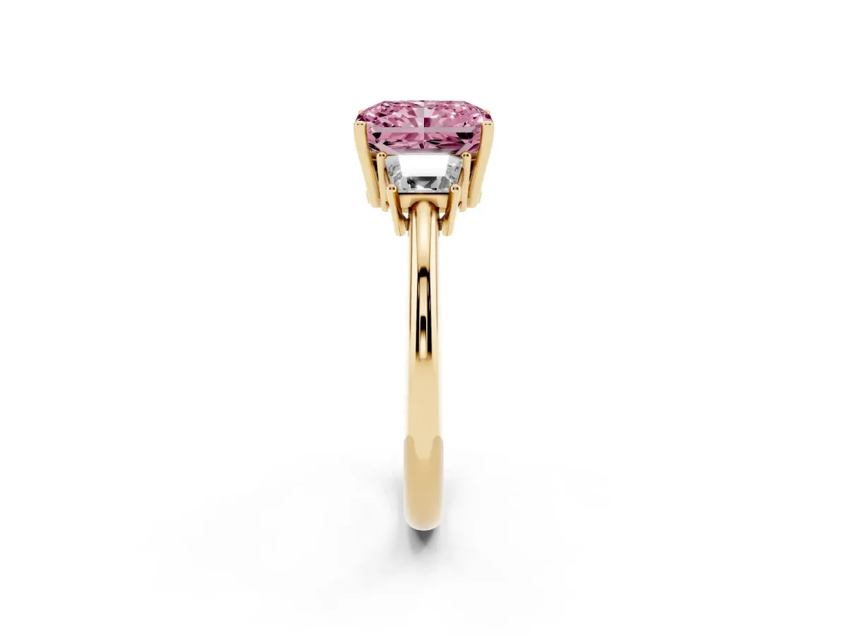 Fancy Pink Radiant Cut Diamond Three-Stone Ring with Trapezoid Side Stones and Prong Setting Yellow gold