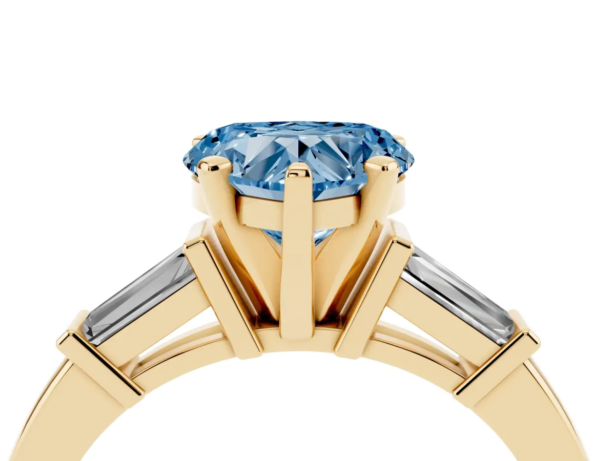 Fancy Blue Heart Cut Cut Diamond Solitaire Ring with Tapered Baguette Accents and Four-Prong Setting Yellow gold