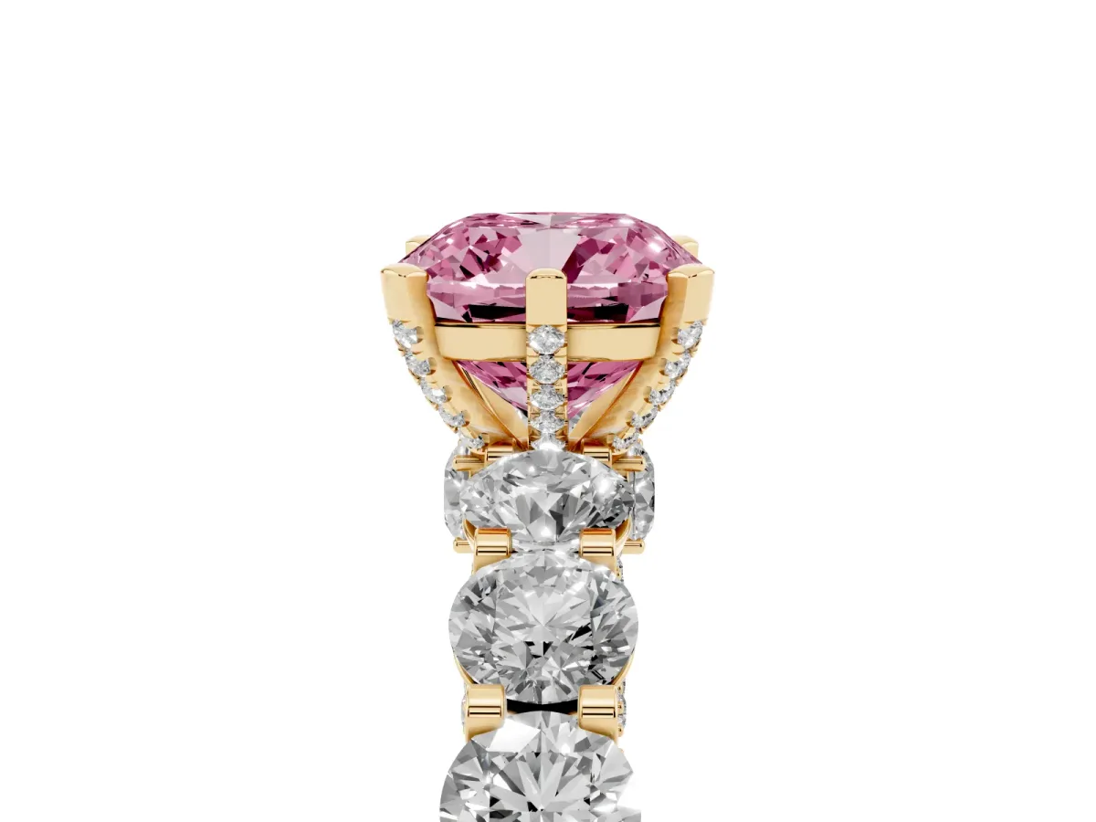 Fancy Pink Cushion Cut Diamond Side Stone Engagement Ring with Four-Prong Setting Yellow gold
