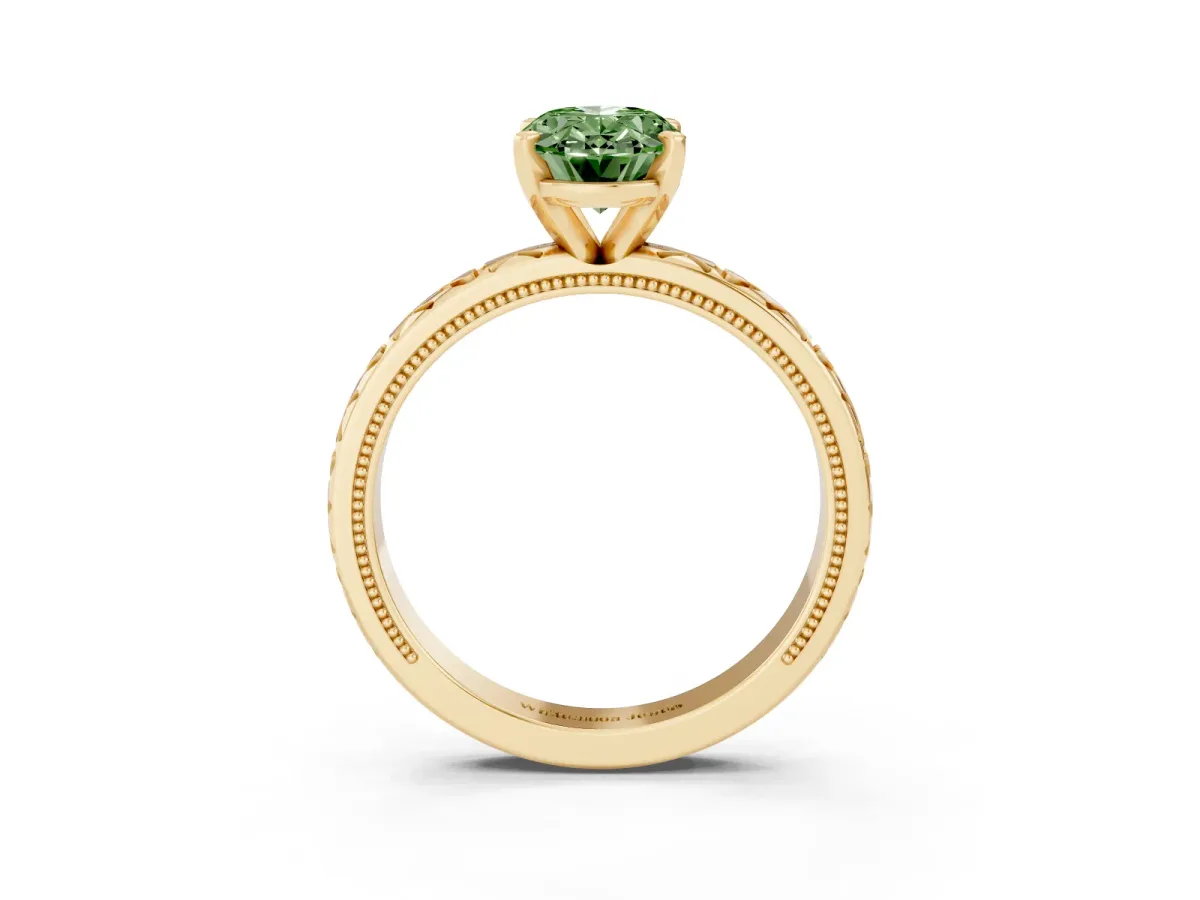Fancy Green Oval Cut Solitaire Diamond Engagement Ring with XO Engraved Band and Four-Prong Setting Yellow gold