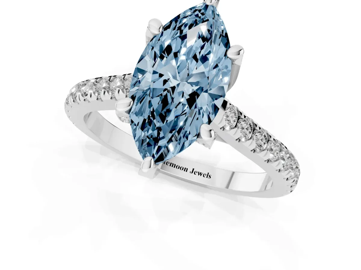 Fancy Blue Marquise Cut Brilliant Diamond Solitaire with Pavé Band and Four-Prong Setting Silver