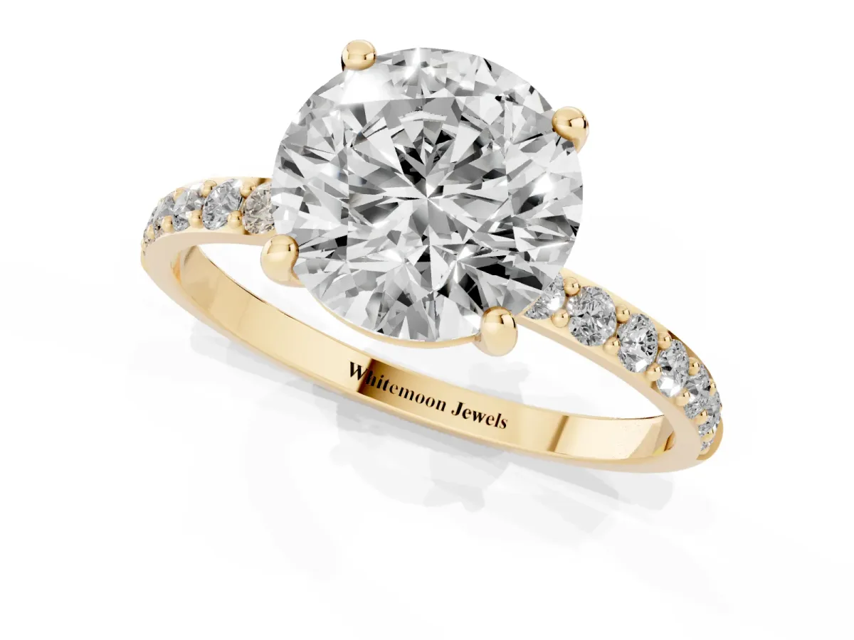 Round Cut Diamond Solitaire Ring with Round Pavé Band and Prong Setting Yellow gold