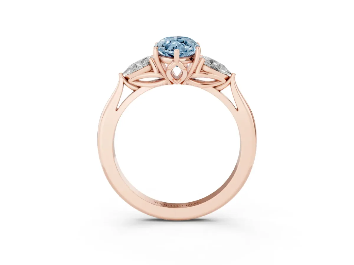 Fancy Blue Three-Stone Marquise Cut Diamond Ring with Pear Side Stones in Four-Prong Setting Rose gold