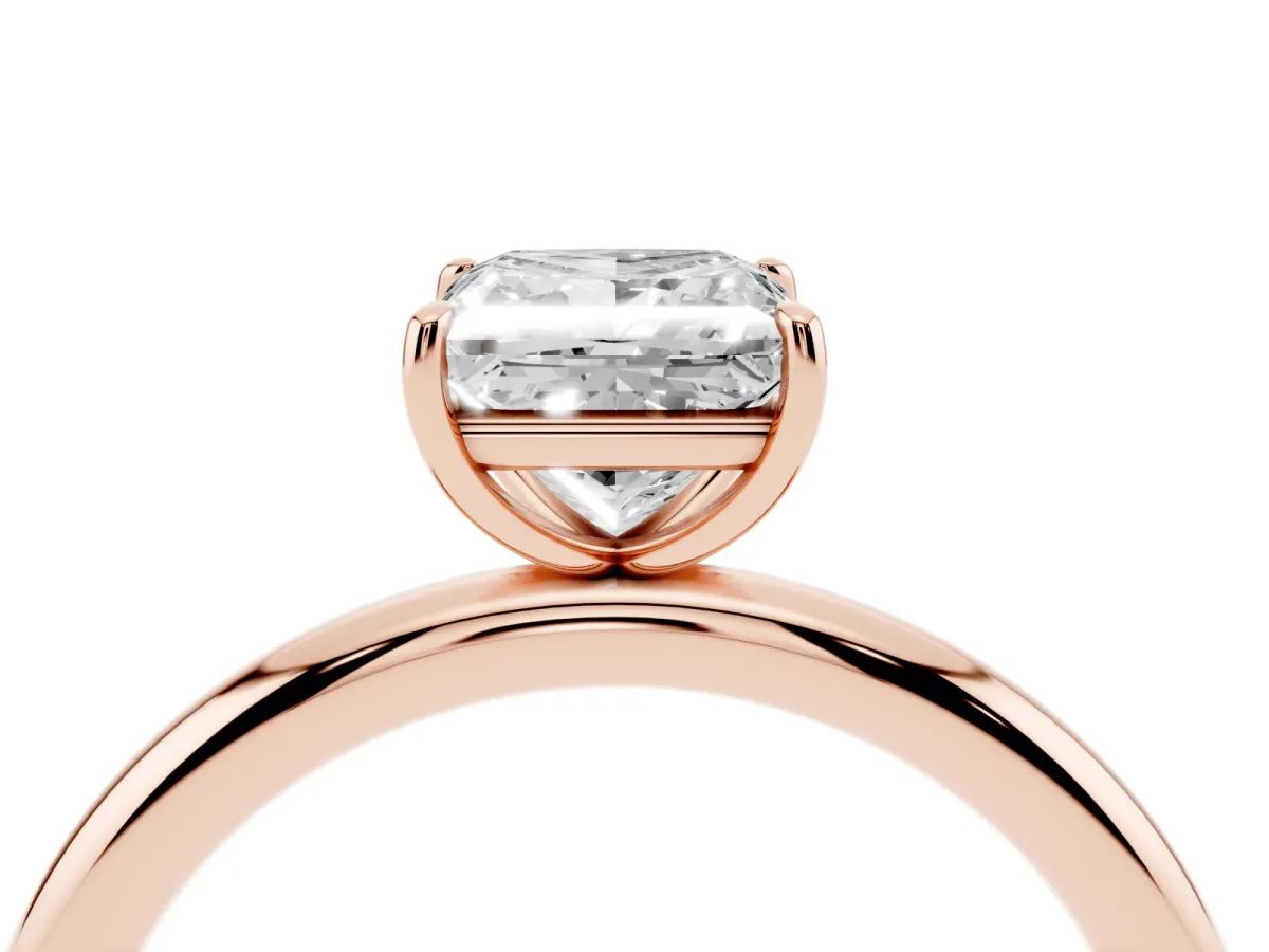 Princess Cut Solitaire Diamond Ring with Four-Prong Setting on a Plain Band Rose gold